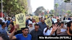 "Мусулман агайындардын" жактоочулары ал-Мухандесиин районундагы демонстрацияда. Каир, 20-декабрь 2013