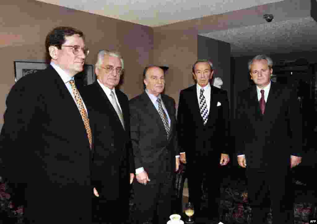 Delegates pose before the Balkan peace talks, on October 31, 1995, near Dayton, Ohio. From left to right: Richard Holbrooke, U.S. Assistant Secretary for European and Canadian Affairs; Franjo Tudjman, President of Croatia; Alija Izetbegovic, President of Bosnia-Herzegovina; Warren Christopher, U.S. Secretary of State; Slobodan Milosevic, President of Serbia.