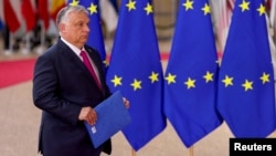 Is Brussels putting more pressure on Hungarian Prime Minister Viktor Orban's government than it can take right now?