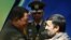Deadly embrace? Venezuela's Hugo Chavez and Iran's Mahmud Ahmadinejad at a welcoming ceremony in Tehran in April 2009.