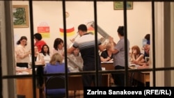 Votes are counted in the South Ossetian poll on June 9. 