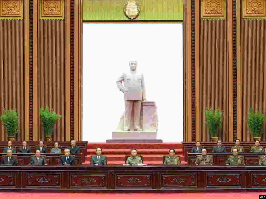 Kim (center) attends the third session of the 12th Supreme People's Assembly in Pyongyang in June 2010.