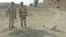 Pakistani paramilitary soldiers guard the site of a landmine blast planted by alleged Baluch nationalists in the Dera Bugti region in 2006.