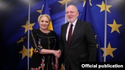 European Commission First Vice President Frans Timmermans (right) said he had spoken several times with Romanian Prime Minister Viorica Dancila in the past two months.