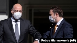 Грција- грчкиот министер за надворешни работи Никос Дендиас и неговиот македонски колега Бујар Османи по средбата во Атина, 14.01.2021
