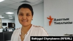 Рита Карасартова.