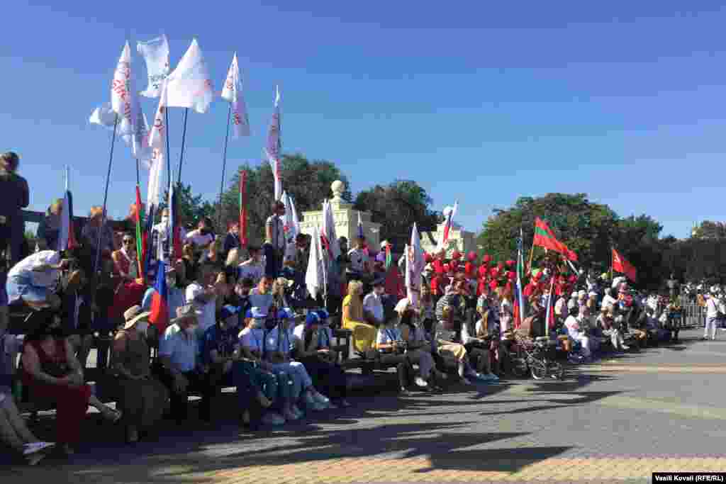A crowd watches the military parade in central Tiraspol on September 2.