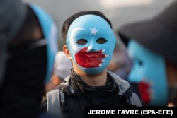 Protest în solidaritate cu uigurii din Xinjiang, decembrie 2019, Hong Kong.