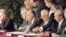 Predsednik Srbije Slobodan Milošević, Predsednik Bosne i Hercegovine Alija Izetbegović i Predsednik Hrvatske Franjo Tuđman u Parizu potpisuju Dejtonski sporazum dok je pored njih tadašnji državni sekretar SAD Voren Kristofer, 14. decembar 1995.