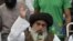 FILE: Khadim Hussain Rizvi, head of the Tehrik-e Labaik Pakistan, a hard-line religious political party, speaks to supporters in November 2018.