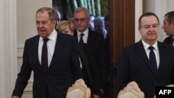 Russian Foreign Minister Sergei Lavrov (left) and acting Serbian Prime Minister Ivica Dacic (right) in Moscow on March 21.