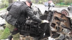 Civilians Die As Shells Rip Apart Cars Near Donetsk