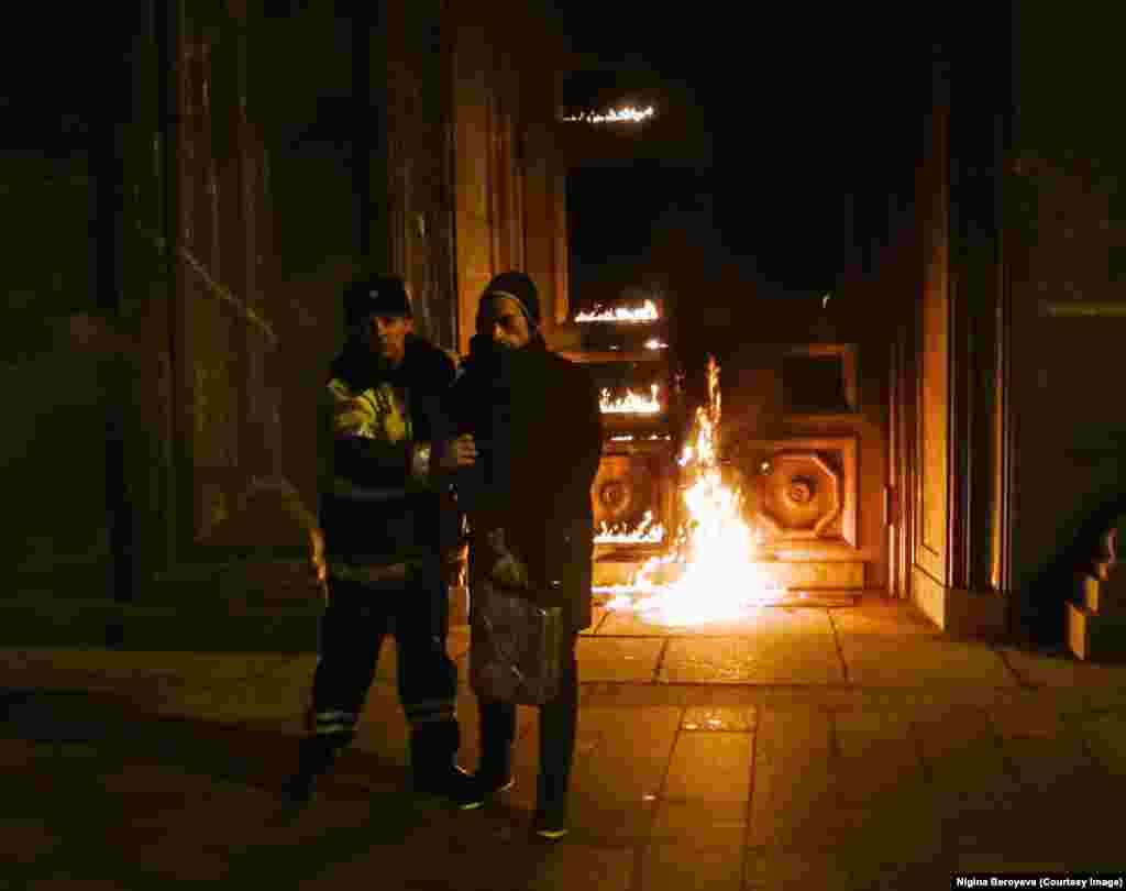 After forcing him to the pavement, Romensky recalls the men "sitting on top of me." In an attempt to safeguard the historic footage he'd just made, Romensky tried to pull the memory card out of his camera as he struggled under the men. "While I was trying to get the SD card out of the camera, [the memory card] broke in half. I got nothing from that night, just the experience!"