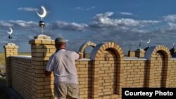 Могила убитого активиста из поселка Атасу Галы Бактыбаева. Карагандинская область 
