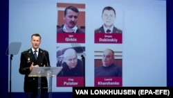 Konferencija za novinare o obaranju aviona, 2019. Na fotografijama osumnjičeni Igor Girkin Strelkov, Oleg Pulatov, Sergej Dubinski, Leonid Harčenko.