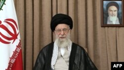 This image released by the office of Iran's supreme leader, Khamenei shows him addressing the nation in a pre-recorded message released on June 26.