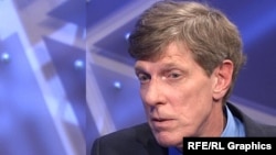 Журналист Брюс Панниер.