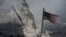 An American flag flies near the base of the destroyed World Trade
Center in New York, one of the targets of the September 11, 2001 terrorist attacks. 