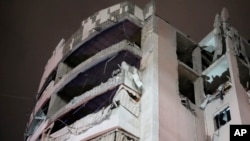 Jedna od oštećenih zgrada nakon izraelskog udara na južno predgrađe Bejruta, Liban, 1. aprila 2025.