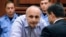 Former Georgian Prime Minister Vano Merabishvili attends a preliminary hearing of his case at the court in Kutaisi on May 22.