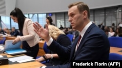 Aleksei Navalny waits for the start of a hearing at the European Court of Human Rights in Strasbourg on January 24.