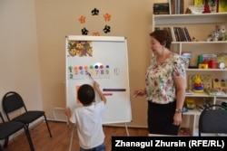 A boy evacuated from Syria learns his numbers in a rehabilitation center in Aqtobe, Kazakhstan. (file photo)