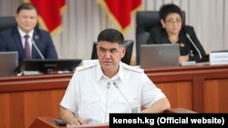 Курсан Асанов.