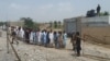 FILE: Voters queued to cast votes in Pakistani general in North Waziristan tribal district on July 25, 2018.