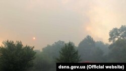 Пожежники гасять вогонь у Чорнобильській зоні, 6 червня 2018 року