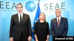 EU foreignpolicy chief Federica Mogherini (middle), Kosovar President Hashim Thaci (right) and Serbian President Aleksandar Vucic meet in Brussels, November 8