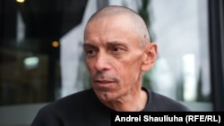 Ihar Karnei in Lithuania in June 2025 following the US-brokered release of 14 prisoners of Belarusian strongman Aleksandr Lukashenko's government. 