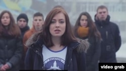 Ukrainian students have released an emotional video calling on their Russian counterparts not to believe what Russia's state-controlled media are saying about their country. 