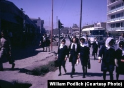 Afghan schoolgirls return home after attending school, an act that the Taliban would ban some 30 years later. "Afghan girls, as well as boys, were educated up to the high school level, and although girls [and boys] wore uniforms, the girls were not allowed to wear a chadri (burqa) on their way to secondary school," says Peg Podlich. "Able young women attended college, as did the men."