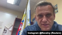 Russian opposition leader Aleksei Navalny waits for a hearing in a police station in Khimki, outside Moscow, on January 18.
