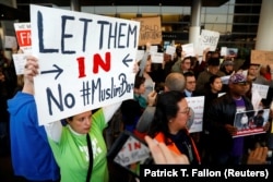 People protest Donald Trump's travel ban from Muslim-majority countries in Los Angeles in 2017.