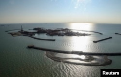 Azerbaýjan we Türkmenistan Hazar deňziniň ortasyndaky üç ýatak üstünde dawalaşdy. Arhiw suraty