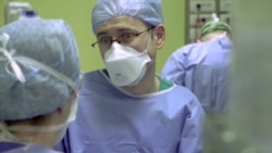 Battle Gear: Shortage Of Masks, Gowns Puts Medics In Danger