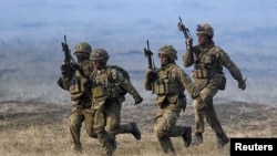 NATO troops take part in the Steadfast Dart 2025 exercise in Romania in February.