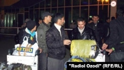 A group of Tajik migrants who were deported from Moscow to Dushanbe last week. 