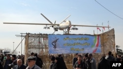 ირანში საგამოფენოდ გამოტანილი დრონი შაჰედ-129. 2016 წლის 11 თებერვალი 