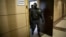 Police raid the offices of Aleksei Navalny's Anti-Corruption Foundation in Moscow last year. The graft watchdog is just one of many NGOs targeted by Russian authorities in the run-up to this year's parliamentary elections. 