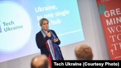 Tech Ukraine director Nataly Vyeryemyeyeva delivers a presentation in Kyiv