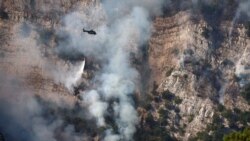 Zjarrfikësit shqiptarë monitorojnë zjarret e egra me dronë termikë