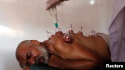 Пакистандагы хижама жасатып жаткан бейтап 