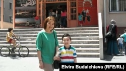 Толкун Турдугулова и ее сын