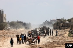 مردم امیدوار اند آتش بس برقرار شود تا بتوانند به مناطق اصلی خود برگردند