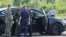 A car and employees of security services are seen at the scene where the body of former Russian Transport Minister Roman Starovoit was found. According to the Russian Investigative Committee, the body of Roman Starovoit with a gunshot wound was found in his car, the main version is suicide.