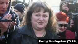 Oksana Sevastidi, a shopkeeper from the Black Sea resort city of Sochi, is released from prison after being pardoned by Russian President on March 12. 