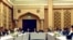 Negotiators from the government of Afghanistan get ready for a meeting with representatives of the Taliban (unseen) in Qatar's capital Doha, on September 15. 