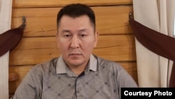 Асланбек Сартбаев.